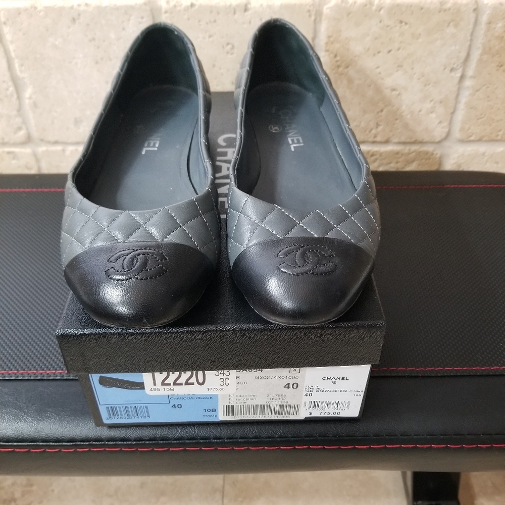 Chanel black and charcoal flats.